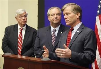 Virginia Gov. Bob McDonnell gestures during a news conference as Lt. Gov. Bill Bolling, center, and House of Delegates Speaker, William Howell, left, look on at the Capitol in Richmond on Wednesday, Nov. 9, 2011.