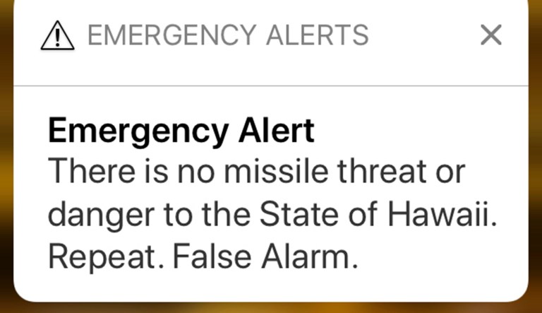 This smartphone screen capture shows the retraction of a false incoming ballistic missile emergency alert sent from the Hawaii Emergency Management Agency system. In response, the White House said that the president has been briefed and that it was "a state exercise." (AP Photo/Caleb Jones)