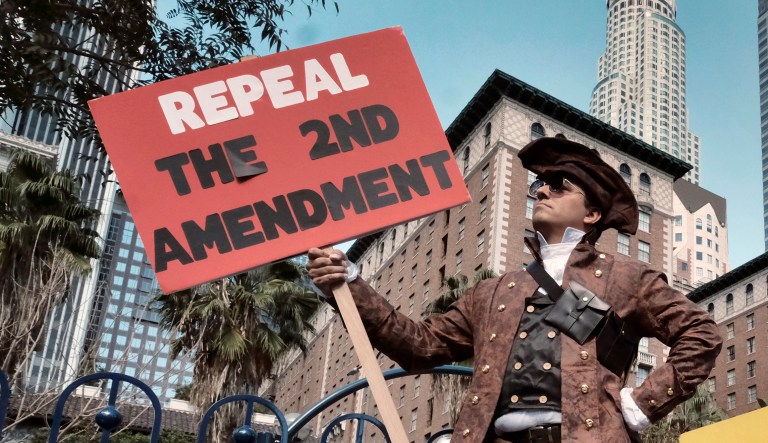 Hundreds of Americans have taken to the streets to campaign for stricter gun laws over the past week after a deadly school shooting in Florida took 17 lives. (AP Photo/Richard Vogel)