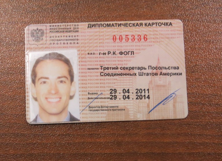 In this handout photo provided by the FSB, acronym for Russian Federal Security Service, an ID of a man claimed by FSB to be Ryan Fogle, a third secretary at the U.S. Embassy in Moscow, issued by the Russian Foreign Ministry, is shown in the FSB offices in Moscow, early Tuesday, May 14, 2013. Russia's security services say they have caught a U.S. diplomat who they claim is a CIA agent in a red-handed attempt to recruit a Russian agent. Ryan Fogle, a third secretary at the U.S. Embassy in Moscow, was carrying special technical equipment, disguises, written instructions and a large sum of money when he was detained overnight, the FSB said in a statement Tuesday. Fogle was handed over to U.S. embassy officials, the FSB, acronym for Russian Federal Security Service, said. (AP Photo/FSB Public Relations Center)