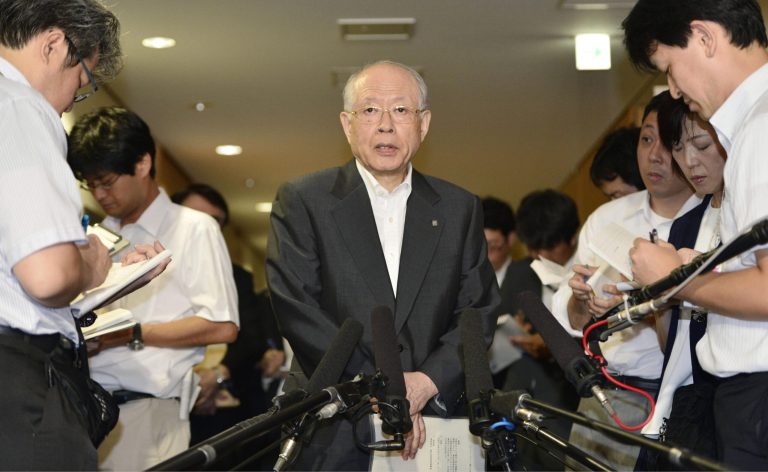 Riken Center for Development Biology director Ryoji Noyori speaks to the media after submitting the government-affiliated research center's organizational overhaul plan to Japanese education, culture, sports and science minister at the ministry in Tokyo Wednesday, Aug. 27, 2014. Riken, the Japanese laboratory that retracted a paper reporting a potentially major breakthrough in stem cell research, said Wednesday its researchers have not managed to replicate the results. Riken scientists said they are still trying to match results reported in two papers published by the journal Nature in January and then retracted in July. But they refused to say whether or not they expected to succeed in doing so. (AP Photo/Kyodo News) JAPAN OUT