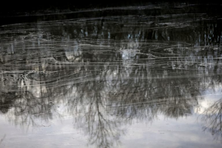 Federal authorities have launched a criminal investigation into a massive coal ash spill into a North Carolina river, demanding that Duke Energy and state regulators hand over reams of documents related to the accident that left a waterway polluted with tons of toxic sludge. (AP image)