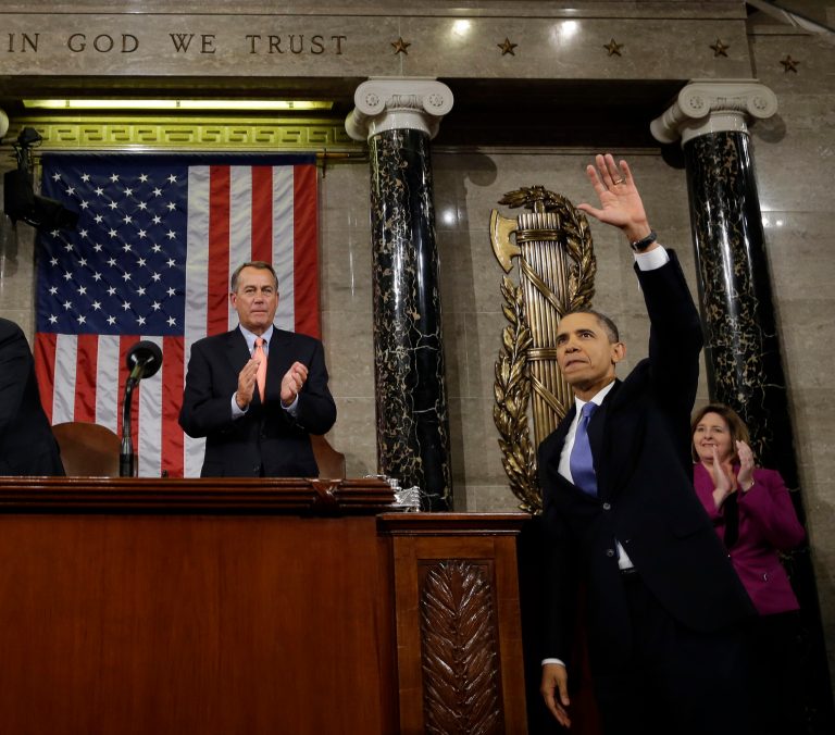 FILE - In this Feb. 12, 2013, file photo, President Barack Obama waves and House Speaker John Boehner of Ohio applauds after the president gave his State of the Union address during a joint session of Congress on Capitol Hill in Washington. (AP Photo/Charles Dharapak, Pool)