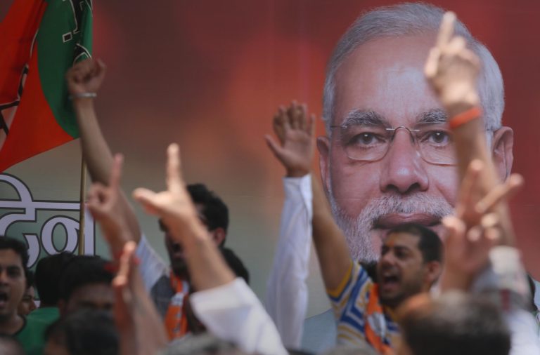 in  New Delhi, India ,Friday, May 16, 2014. (AP Photo /Manish Swarup)