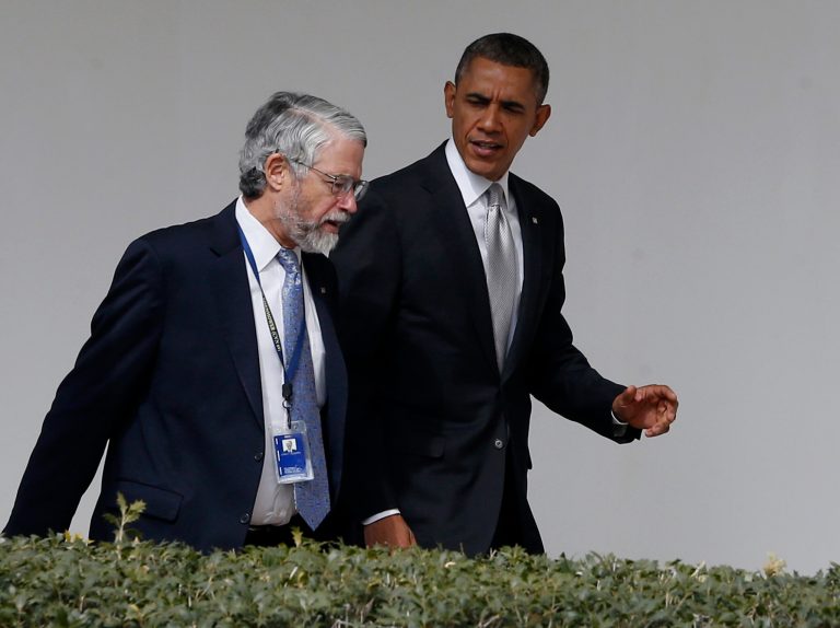 President Obama walks with John P. Holdren, Assistant to the President for Science and Technology and Director of the White House Office of Science and Technology Policy, at the White House in Washington, Friday, March 7, 2014. (AP Photo/Charles Dharapak)
