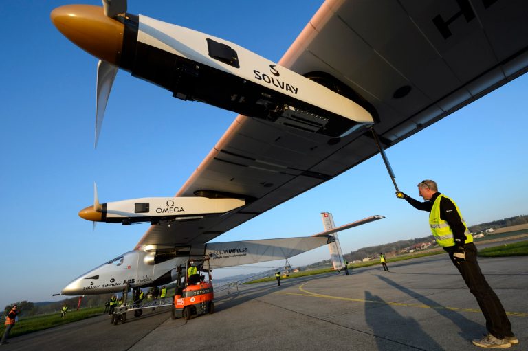 FILE- In this Monday, April 14, 2014 file photo, people stand around the new experimental aircraft 
