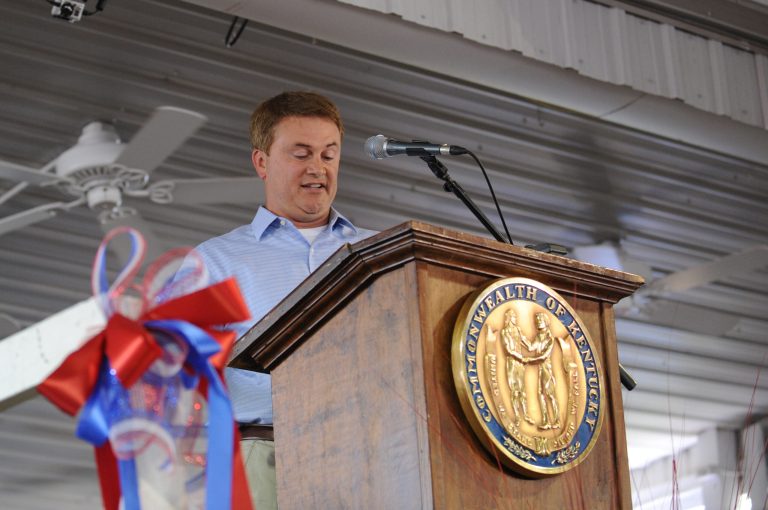 FILE - In this Saturday, Aug. 3, 2013, file photo, Kentucky Commissioner of Agriculture James Comer, R-Thompkinsville, speaks during the 133rd annual Fancy Farm picnic in Fancy Farm, Ky.  Kentucky's Agriculture Department has filed a lawsuit s Wednesday, May, 2014, seeking the release of imported hemp seeds being held up by federal officials. The state Agriculture Department wants to distribute the seeds for use in pilot projects that would be Kentucky's first hemp crop in decades. Holly Harris VonLuehrte , chief of staff to Comer, says federal officials wanted the state to apply for a permit.  (AP Photo/Stephen Lance Dennee)