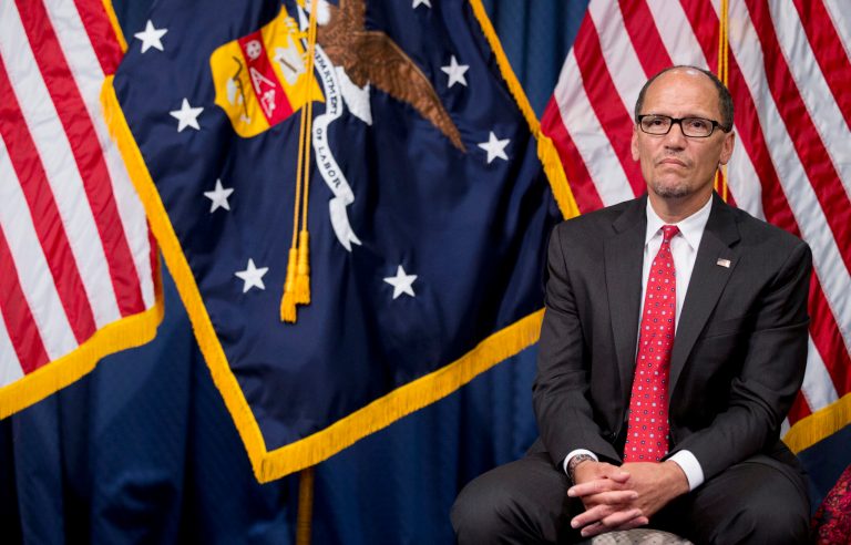New Labor Secretary Thomas Perez listens to remarks by Vice President Joe Biden, not in picture, before being sworn in as the 26th secretary of labor during a ceremony at the Labor Department in Washington, Wednesday, Sept. 4, 2013.