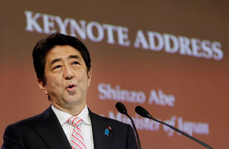 Japanese Prime Minister Shinzo Abe delivers his keynote speech on Friday, May 30, 2014 in Singapore. Abe is in Singapore to attend the 13th Asia Security Summit. (AP Photo/Wong Maye-E)