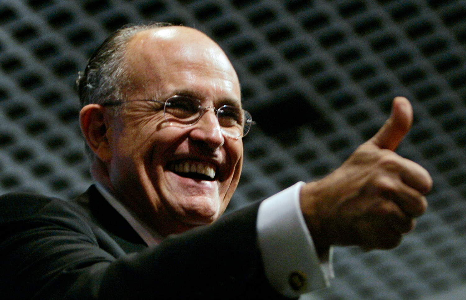 Rudy Giuliani asks how Hillary Clinton can call herself a feminist