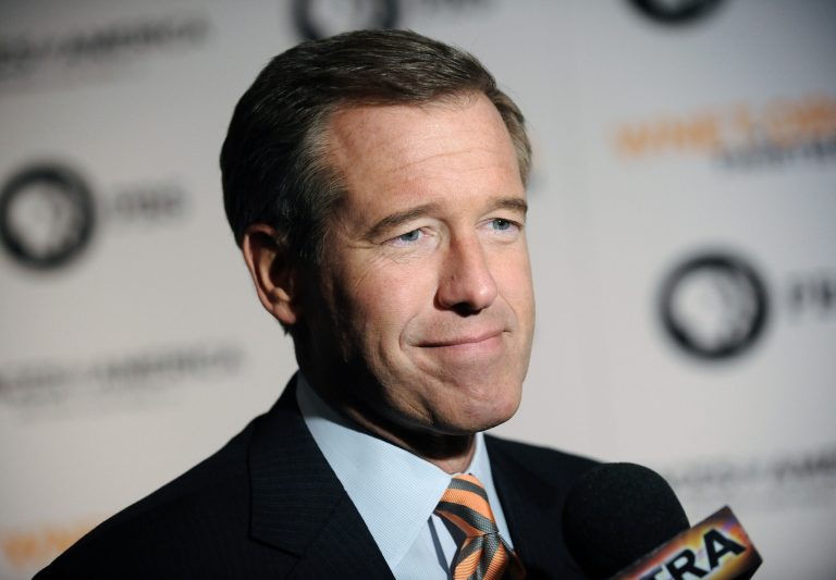 The New York Times calls NBC anchorman Brian Williams' untrue story of braving danger aboard a helicopter in Iraq as a mistaken claim. But other news outlets are less persuaded that the retracted tale was simply a mistake. (AP Photo/Evan Agostini)