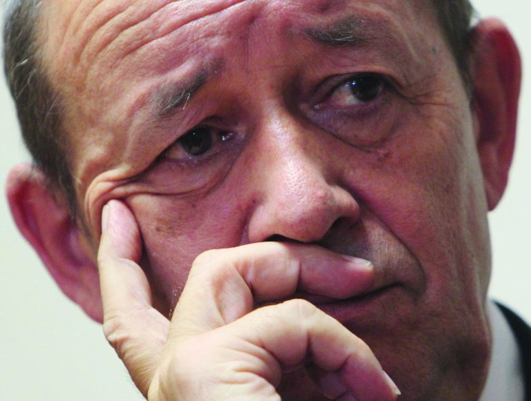 FILE - In this Monday, June 11, 2012 file photo, French Defense Minister Jean-Yves Le Drian listens to a question during a news conference in Kabul, Afghanistan. Le Drian said Saturday, Jan. 12, 2013, that a French soldier is missing after an unsuccessful commando raid in Somalia to rescue an intelligence agent who was killed by his captors during the fighting. (AP Photo/Musadeq Sadeq, File)