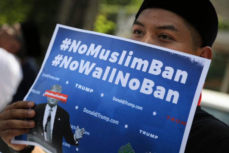 A federal judge in Seattle on Friday ordered a temporary nationwide restraining order to halt President Trump's executive order that bans refugees and asylum seekers from seven countries in the Middle East and North Africa. (AP Photo/Vincent Thian)