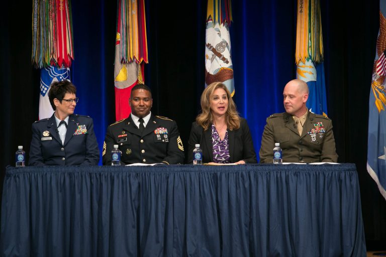 From left, Chaplain Col. Karis Graham-Oliphant, Master Sgt. Robert Code, Amanda Simpson, and Maj. Alasdair Mackay take part in at an LGBT pride month event at the Pentagon, Tuesday, June 9. 2015. (Graeme Jennings/Washington Examiner)