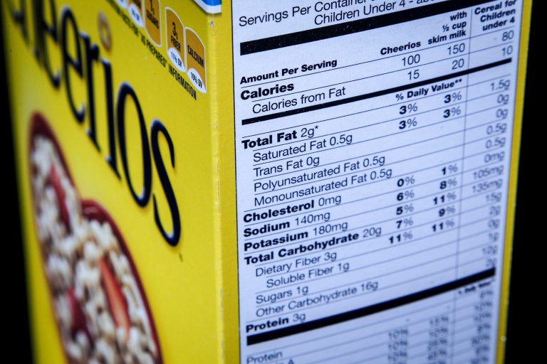 The nutrition facts label on the side of a cereal box is photographed in Washington, Thursday, Jan. 23, 2014. Nutrition labels on the back of food packages may soon become easier to read. The Food and Drug Administration (FDA) says knowledge about nutrition has evolved over the last 20 years, and the labels need to reflect that. (AP Photo/J. David Ake)