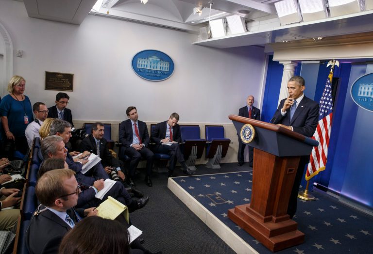 President Obama in a year-end press conference Friday urged the public to engage each another on issues of race, saying problems exposed in the wake of police killings in Ferguson, Mo., and New York City could not be solved without wide-ranging discussions on the sensitive topic. (AP/J. Scott Applewhite)