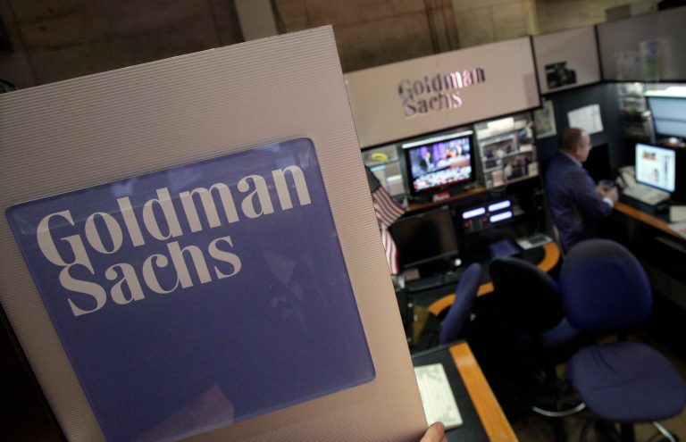 A trader works in the Goldman Sachs booth on the floor of the New York Stock Exchange. The field of potential successors to CEO Lloyd Blankfein has narrowed with co-Chief Operating Officer Harvey Mitchell's retirement. (AP Photo/Richard Drew, File)