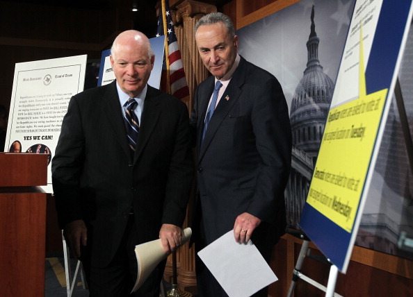 WASHINGTON, DC - DECEMBER 14:  U.S. Sen. Charles Schumer (D-NY) (R) and Sen. Benjamin Cardin (D-MD) (L) leave after a news conference December 14, 2011 on Capitol Hill in Washington, DC. Cardin and Schumer have introduced a bill to create tough penalties for those who create and distribute false and deceptive voting information and campaign literature.  (Photo by Alex Wong/Getty Images)