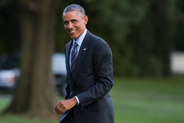 President Barack Obama smiles as he arrives on the South Lawn of the White House, on Friday, Sept. 12, 2014, in Washington. Obama traveled to the Fort McHenry historic site that is celebrating the 200th anniversary of the Battle of Baltimore, and also attended a private Democratic fundraiser. (AP Photo/Evan Vucci)