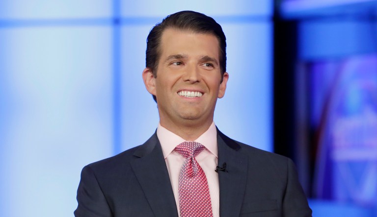 Donald Trump Jr. told Fox News's Sean Hannity Tuesday night that congressional Democrats wanted to, but couldn't, stand to applaud his father during President Trump's State of the Union. (AP Photo/Richard Drew)