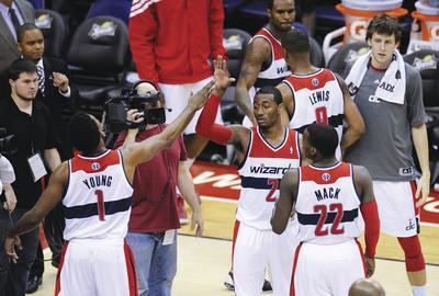 Wizards grab first win