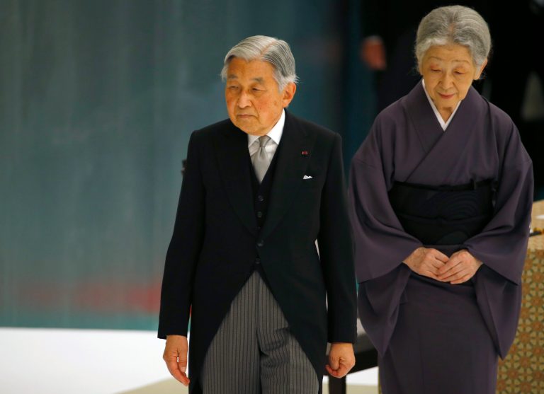 Japan's Emperor Akihito, accompanied by Empress Michiko, leaves after delivering his remarks during a memorial service at Nippon Budokan martial arts hall in Tokyo, Saturday, Aug. 15, 2015. (AP Photo/Shizuo Kambayashi)