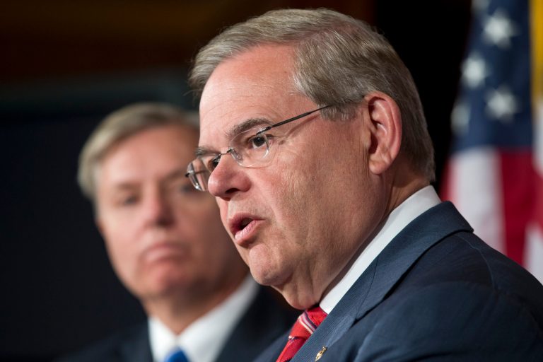 Sen. Robert Menendez, D-N.J., right, chairman of the Senate Foreign Relations Committee, and Sen. Lindsey Graham, R-S.C., speak to reporters just after the Senate voted 99-0, for a resolution that would affirm support for Israel if it is forced to take military action to defend itself from an Iranian nuclear threat, on Capitol Hill in Washington, Wednesday, May 22, 2013. (AP Photo/J. Scott Applewhite)
