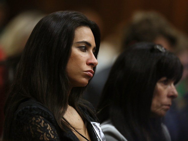 Friend of the late Reeva Steenkamp, Kim Myers, listens to a witness giving evidence during the murder trial of Oscar Pistorius, in Pretoria, South Africa, Tuesday May 6, 2014   Pistorius is charged with the shooting death of his girlfriend Reeva Steenkamp on Valentine's Day in 2013. (AP Photo. (AP Photo/Alon Skuy, Pool)