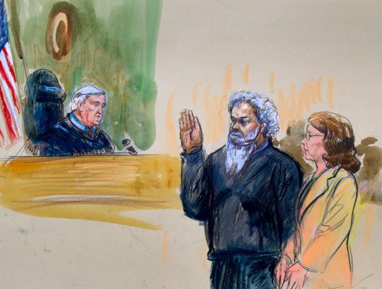 This artist's rendering shows United States Magistrate, Judge John Facciola, swearing in the defendant, Libyan militant Ahmed Abu Khatallah, wearing a headphone, as his attorney Michelle Peterson looks on during a hearing at the federal U.S. District Court in Washington, Saturday, June 28, 2014. The hearing of the Libyan accused of masterminding deadly Benghazi attacks, lasted ten minutes; he pled not guilty to conspiracy Saturday at his first appearance in U.S. court. (AP Photo/Dana Verkouteren)