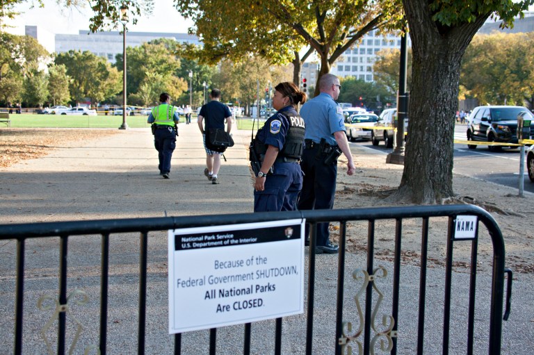 A few scattered barriers around the National Mall have signs informing visitors that the area is closed as a result of the government shutdown. (AP Photo/J. Scott Applewhite)