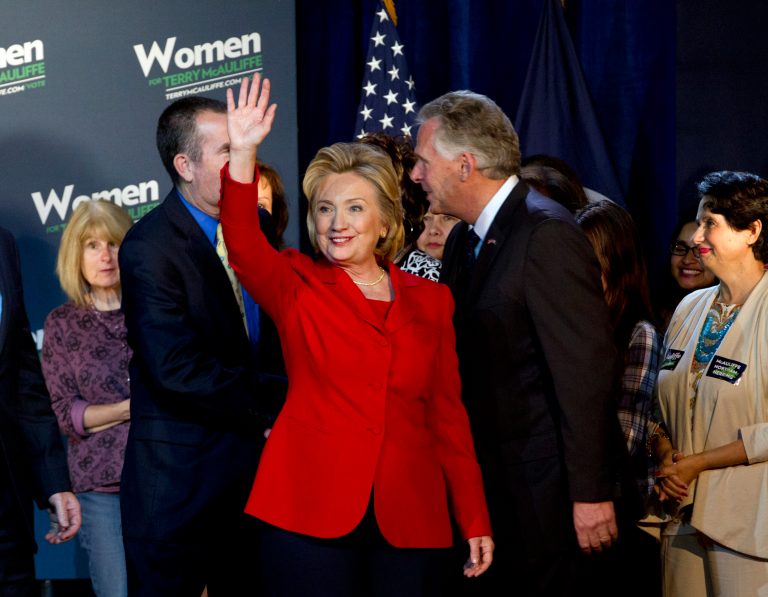 Former Secretary of StateÃÂ HillaryÃÂ ClintonÃÂ waves to the crowd during a campaign rally for Democrat Virginia gubernatorial candidate Terry McAuliffe at the State Theater in Falls Church, Va., on Oct. 19. ( AP/Jose Luis Magana)