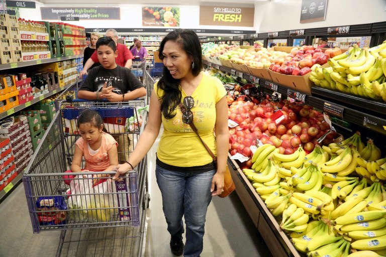 To play, kids simply need to mark off each time their parents buy a healthy food, until they get five across. (Photo by Casey Rodgers/Invision for ALDI/AP Images)