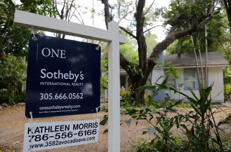 This Monday, May 19, 2014 photo shows a home for sale in the Coconut Grove neighborhood of Miami. Standard & Poor's/Case-Shiller reports on U.S. home prices in March and for the first quarter of the year on Tuesday, May 27, 2014. (AP Photo/Lynne Sladky)