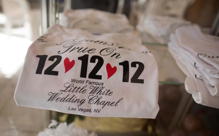   Tee shirts advertising the 12-12-12 date sit on display at A Little White Wedding Chapel, Tuesday, Dec. 11, 2012, in Las Vegas. These âonce-in-a-centuryâ wedding dates have become more important each year as people increasingly look outside Vegas for nontraditional weddings. Once known as the wedding capital of the world, Vegas' share of the U.S. wedding market has fallen by a third since 2004. (AP Photo/Julie Jacobson)   