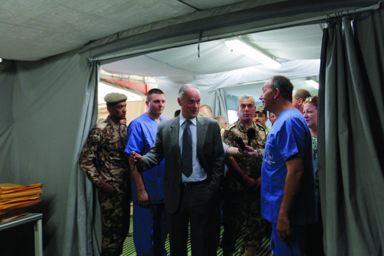 Francesco Fransoni, Italian ambassador to Jordan, center, tours the Italian Field Hospital for Syrian refugees, which was established in al-Mafraq city, Jordan, Tuesday, July 10, 2012. (AP Photo/ Mohammad Hannon)