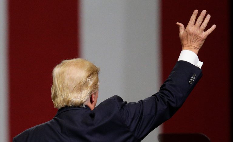 President Donald Trump waves goodbye to the crowd after he speaks at a campaign rally in support of Sen. Luther Strange, Friday, Sept. 22, 2017, in Huntsville, Ala. (AP Photo/Brynn Anderson)