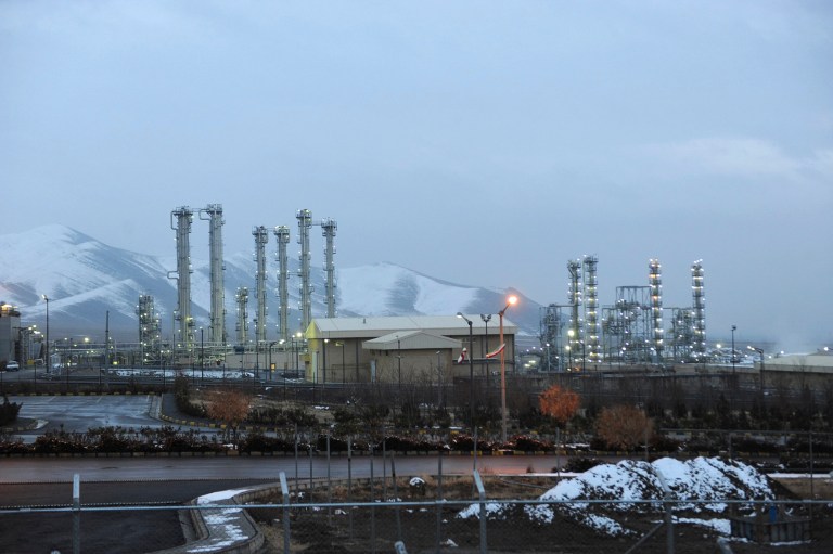 FILE--In this Jan. 15, 2011 file photo, Iran's heavy water nuclear facility near the central city of Arak is backdropped by mountains. Iran's reformers and moderate conservatives welcomed an agreement between Iran and six world powers on how to implement a nuclear deal struck in November, saying it will shore up Iran's sanctions-hit economy but hardliners still remain opposed. The six-nation group - the five permanent members of the U.N. Security Council plus Germany - and Iran have agreed to start implementing the terms of the historic interim deal from Jan. 20. That will start a six-month clock for a final deal to be struck over the Islamic Republic's contested nuclear program. (AP Photo/ISNA, Hamid Foroutan, File)