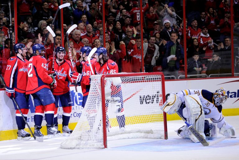 Nick Wass/AP
Marcus Johansson, center, scored one of the Capitals' three goals in a 5:22-span in the second quarter of a victory over the Sabres.