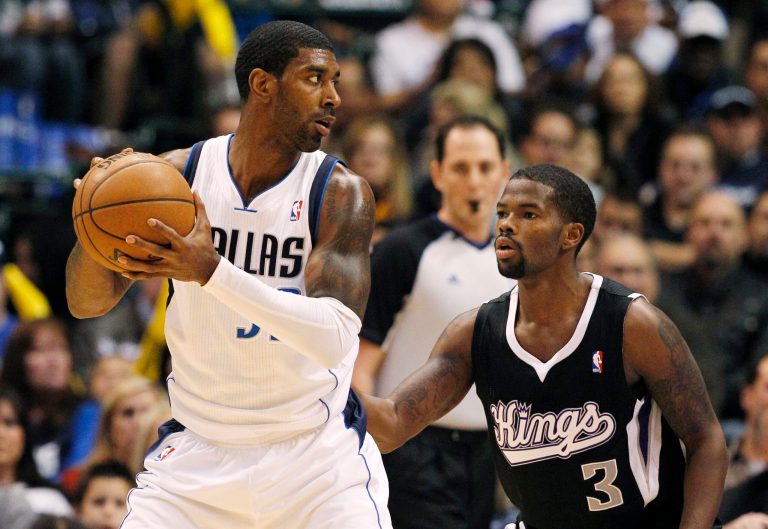 Dallas Mavericks' O.J. Mayo (32) looks for an opening against Sacramento Kings' Aaron Brooks (3) in the first half of an NBA basketball game Monday, Dec. 10, 2012, in Dallas. (AP Photo/Tony Gutierrez)