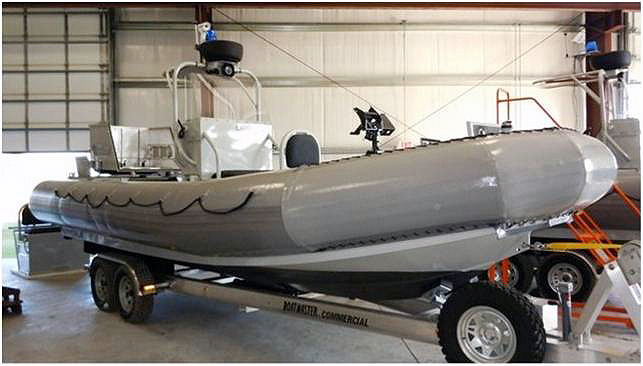 A patrol boat that was supposed to be sent to Afghanistan four years ago sits in a warehouse in Yorktown, Va. (Photo: SIGAR)