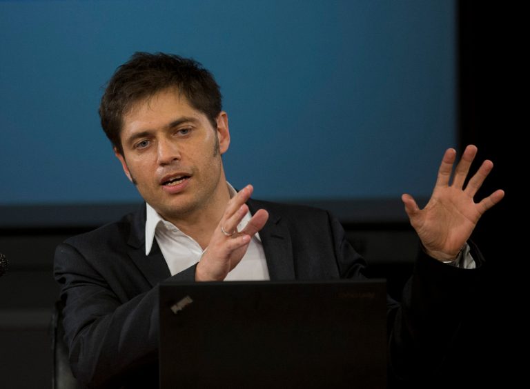 Argentina's Economy MInister Axel Kicillof talks to the media at a press conference to explain the recent U.S. Supreme Court's ruling on Argentina's bond default, in Buenos Aires, Argentina, Tuesday, June 17, 2014. The Argentine economy minister says the government is working on a debt swap that would make payments in Argentina to creditors who accepted previous debt restructurings. (AP Photo/Eduardo Di Baia)