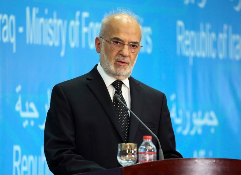 Iraqi Foreign Minister Ibrahim al-Jaafari listens to a question during a joint press conference with his Iranian counterpart Mohammad Javad Zarif in Baghdad, Iraq, Monday, July 27, 2015. (AP Photo/ Karim Kadim)