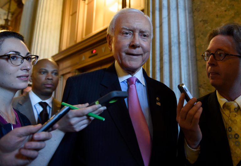 Sen. Orrin Hatch, R-Utah. is surrounded by reporters as he walks to a luncheon with other Senate Republicans on Capitol Hill in Washington, Friday, May 22, 2015. (AP Photo/Susan Walsh)