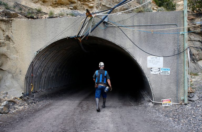A miner enters a auxiliary entrance at the Sufco Coal Mine, 30 miles east of Salina, Utah on May 28, 2014. The Sufco mine produces 30,000 tons of more environmentally friendly low sulfur coal a day which is delivered to coal-fired power plants throughout the western United States. (Photo by George Frey/Getty Images)