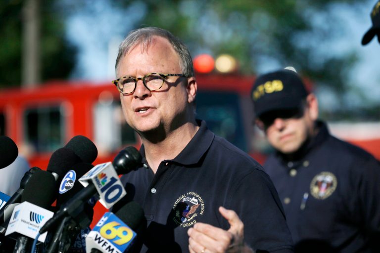 National Transportation Safety Board member Robert Sumwalt answers a question as he describes findings thus far in the investigation of Tuesday's deadly train derailment Thursday, May 14, 2015, in Philadelphia. (AP Photo/Mel Evans)
