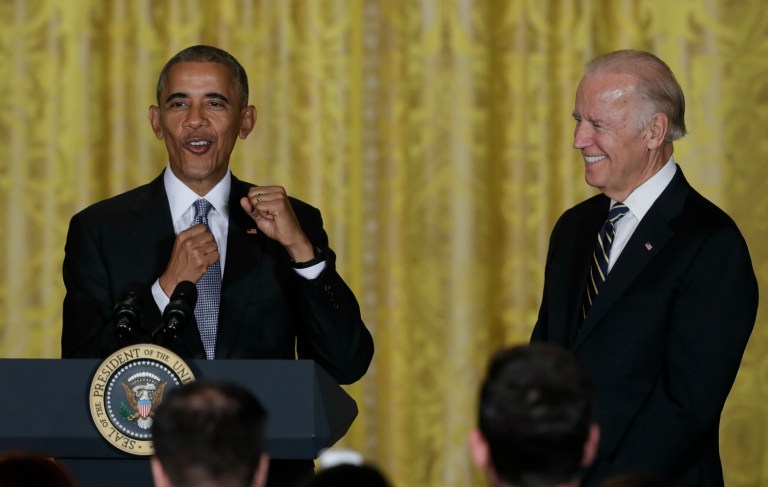 President Barack Obama, joined by Vice President Joe Biden, gestures as he speaks during a reception for Hispanic Heritage Month in the East Room of the White House, Wednesday, Oct. 12, 2016, in Washington. (AP Photo/Carolyn Kaster)