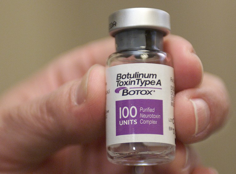 FILE - This March 20, 2002 file photo shows a vial of Botox, made by Allergan. Valeant Pharmaceuticals has pumped more cash into its bid to buy Allergan, and it also defended its business model on Wednesday, May 28, 2014, a day after its reluctant acquisition target aired more concerns about a deal. (AP Photo/Damian Dovarganes, File)