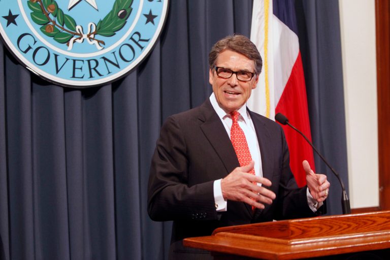 Gov. Rick Perry makes a statement in Austin, Texas on Saturday, Aug. 16, 2014 concerning the indictment on charges of coercion of a public servant and abuse of his official capacity. (AP Photo/Michael Thomas)
