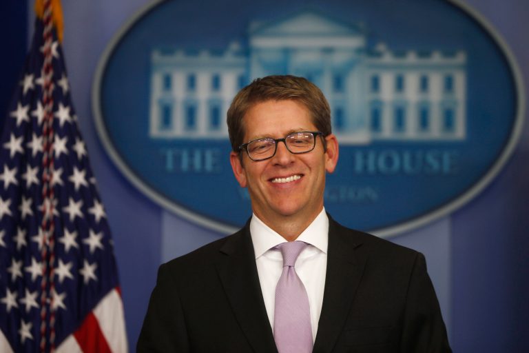 White House Press Secretary Jay Carney smiles as he arrives for the daily press briefing at the White House on Wednesday. (AP/Charles Dharapak)
