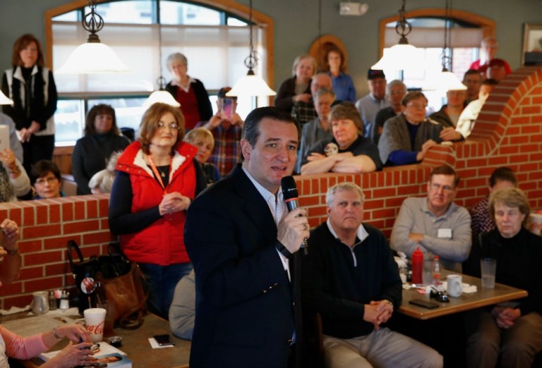 Despite coming under fire from every angle and facing legal threats from Donald Trump, Ted Cruz is assuring his supporters he'll fight clean. (AP Photo)